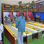 Skeeball Classic II games at an outdoor event in Palo Alto provided by Arcade Party Rental